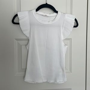 White sleeved, ribbed tank.